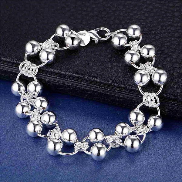Pulseira Gotas de Prata feita em Prata 925, Hipoalergênica e Sustentável. Com 20 cm de comprimento e 20g, esta peça é Versátil, durável e perfeita para todas as ocasiões. Adicione Elegância ao seu estilo com esta pulseira que combina Conforto, qualidade e sofisticação. Compre hoje com frete grátis para sua região!
