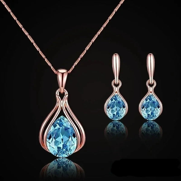 Descubra o encanto do Conjunto Colar e Brincos Gota, perfeito para mulheres que buscam sofisticação e estilo em acessórios de alta qualidade. Combinando as cores vibrantes Azul e Verde, este conjunto é ideal para ocasiões especiais como Casamentos, Viagens e Presentes Exclusivos. Adorne-se com elegância e distinção.