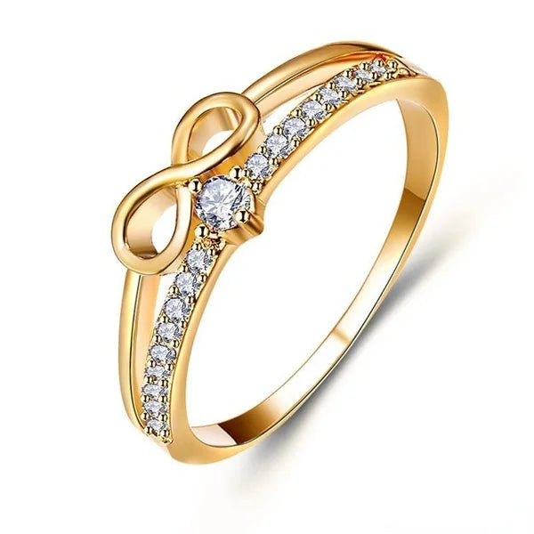 Descubra o encanto do Anel do Amor Infinito, uma peça romântica e elegante para noivados, casamentos e festas. Feito com materiais de Alta Qualidade, como Zinco e Prata, este Anel combina Design Moderno com Durabilidade. Adicione um toque de Glamour ao seu visual com este Anel. Compre agora e celebre o Amor Eterno!