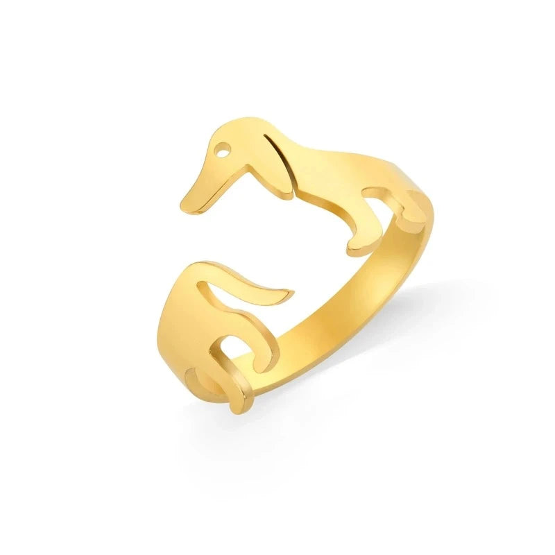 Descubra o encanto do Anel Basset Dog Charmoso, perfeito para quem ama cachorros. Feito de aço inoxidável hipoalergênico, este anel ajustável é uma escolha elegante e durável. Celebre seu amor pelos animais com estilo! Compre hoje com frete grátis e desconto pagando no PIX!