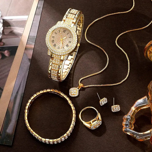 Descubra o Conjunto Luxo Dourado, uma combinação perfeita de Elegância e Sofisticação. Este Conjunto inclui um Relógio, Pulseira, Colar e Brincos de Strass, proporcionando um Estilo Versátil para todas as ocasiões. Adorne-se com Glamour e Celebre Sua Singularidade com este Conjunto Completo de Acessórios de Luxo.