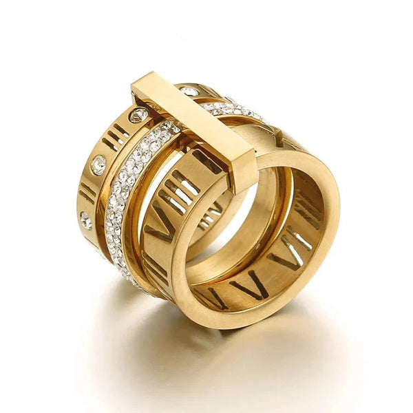 Descubra o ANEL TRÊS CAMADAS Zircônia Romana, uma expressão de ELEGÂNCIA e sofisticação. Feito com aço inoxidável de ALTA QUALIDADE e detalhes em Zircônia, este anel é perfeito para qualquer ocasião. Disponível em cores como Ouro, Prata e Rosé, é a escolha ideal para quem busca um ANEL VERSÁTIL e durável.