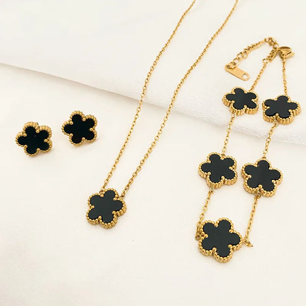 Desperte sua elegância com o Conjunto Floral Elegante. Este luxuoso Conjunto de Jóias Femininas, feito de Aço Inoxidável, inclui Pulseira, Colar e Brincos, perfeito para todas as ocasiões. Celebre sua feminilidade com este Conjunto de Moda Floral, um presente que exala sofisticação e estilo.