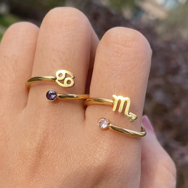 Descubra a beleza duradoura do Anel Astrologia, uma jóia celestial que incorpora o zodíaco em cada detalhe. Feito com aço resistente, este Anel Banhado a Ouro 18K é a escolha perfeita para quem busca estilo, autenticidade e conexão astral. Afirme-se com glamour celestial.