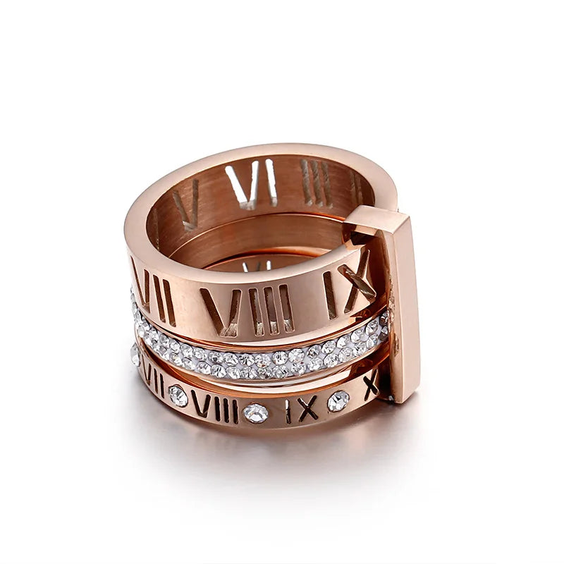 Descubra o ANEL TRÊS CAMADAS Zircônia Romana, uma expressão de ELEGÂNCIA e sofisticação. Feito com aço inoxidável de ALTA QUALIDADE e detalhes em Zircônia, este anel é perfeito para qualquer ocasião. Disponível em cores como Ouro, Prata e Rosé, é a escolha ideal para quem busca um ANEL VERSÁTIL e durável.