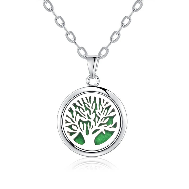 Descubra a harmonia com o Colar Aromático Árvore da Vida. Elegante e versátil, este Colar em Aço Inoxidável combina bem-estar e estilo, proporcionando uma experiência única de aromaterapia. Adapte-se a cada ocasião com confiança, celebrando sua individualidade. Potencialize seu dia com este Colar terapêutico.