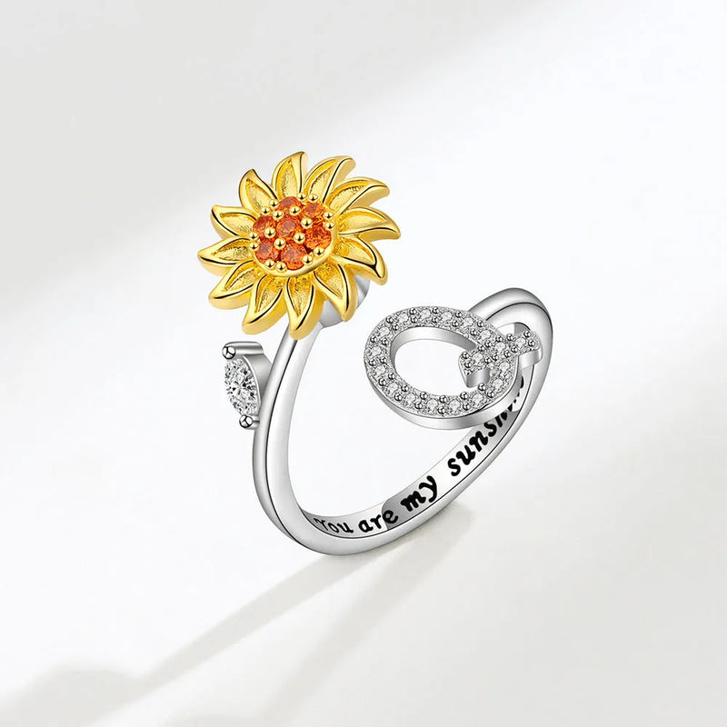 Descubra o encanto do Anel Girassol Antiansiedade, uma joia única em Aço Inoxidável. Experimente a Tranquilidade Diária com este Anel Giratório, expressão singular de Moda Elegante. Um Presente Memorável, unindo Glamour Diário e Estilo Único. Celebre a Moda Durável com um toque de Alegria no dedo. Adquira já!